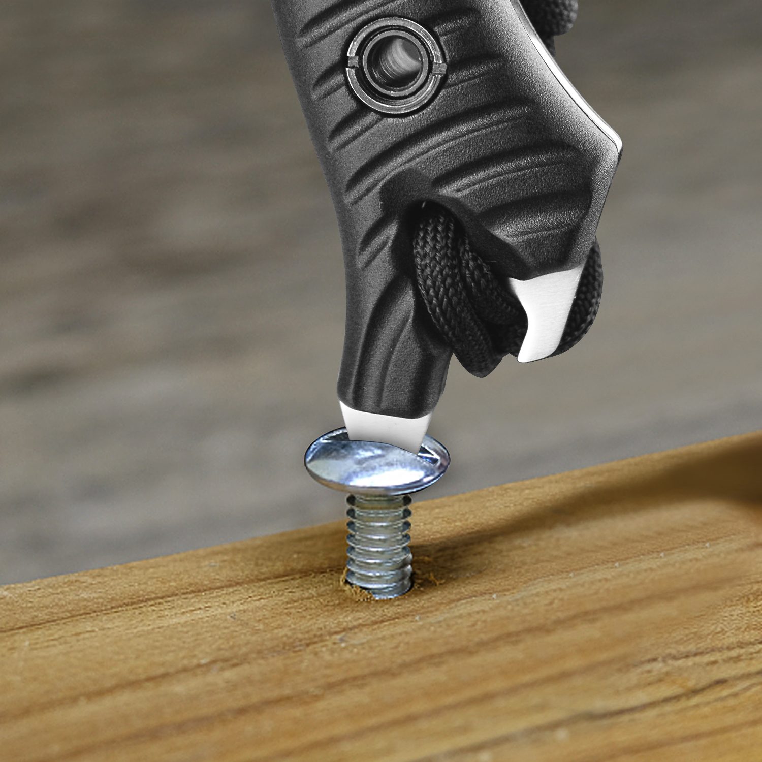 Close-up of a joiner hand with a wrench screwing nut a furniture screw into a wooden plank, The effort wrong of tools as a fail concept